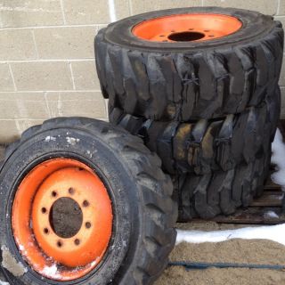 Bobcat Skid Steer off set Rims with Power King 10 16.5 Tires. Set of