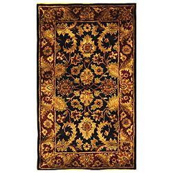 Handmade Classic Regal Black/ Burgundy Wool Rug (3 X 5) (BlackPattern OrientalMeasures 0.625 inch thickTip We recommend the use of a non skid pad to keep the rug in place on smooth surfaces.All rug sizes are approximate. Due to the difference of monitor