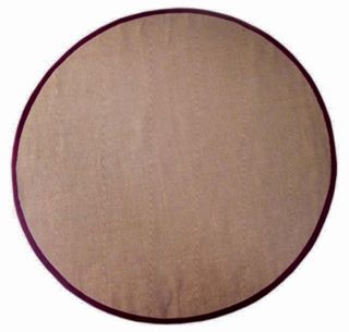 Hand woven Cherry Brown Sisal Wool Rug (8 Round) (burgundyPattern borderMeasures 0.33 inch thickTip We recommend the use of a non skid pad to keep the rug in place on smooth surfaces.All rug sizes are approximate. Due to the difference of monitor colors