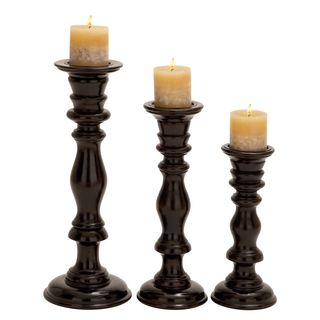 Black Wood Antique Candle Holders (set Of 3) (Quality wood Finish: Black3 piece set includesLarge candle holder: 7 inches diameter x 18 inches highMedium candle holder: 7 inches diameter x 15 inches highSmall candle holder: 7 inches diameter x 12 inches h
